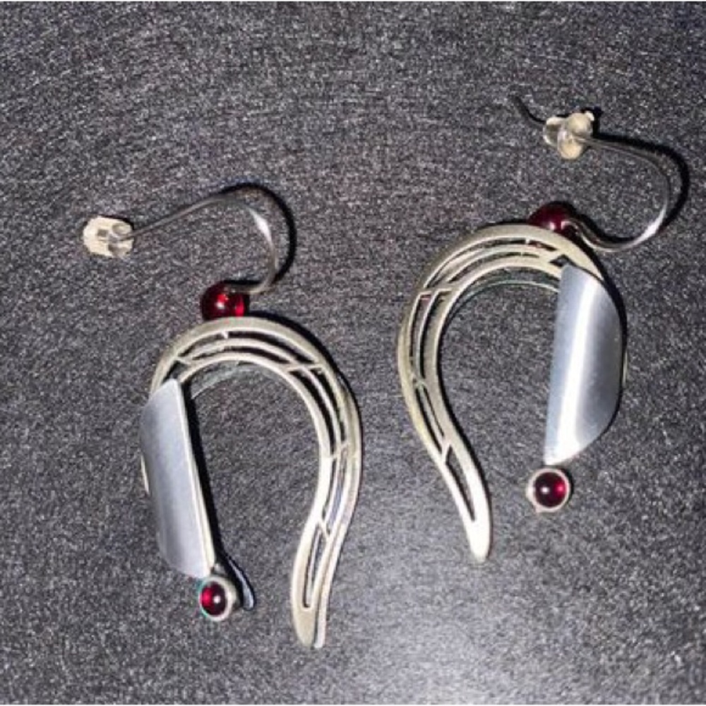 Christoph Poly silver horseshoe wire earrings with burgundy stone accent.